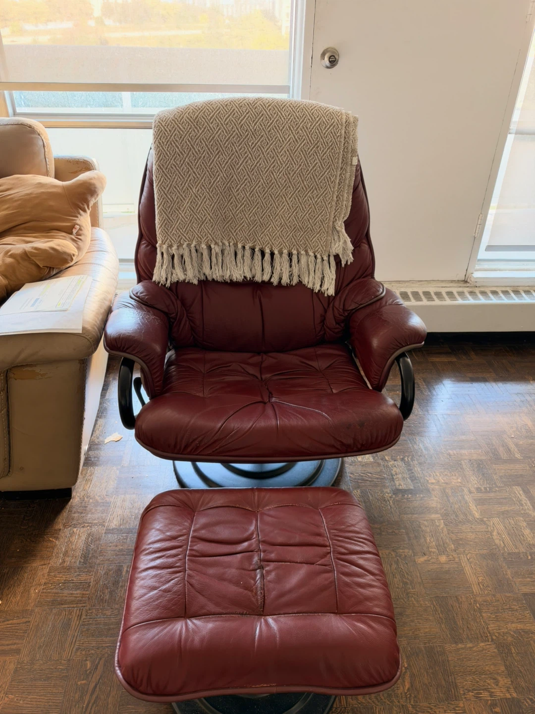 Burgundy recliner chair & footrest