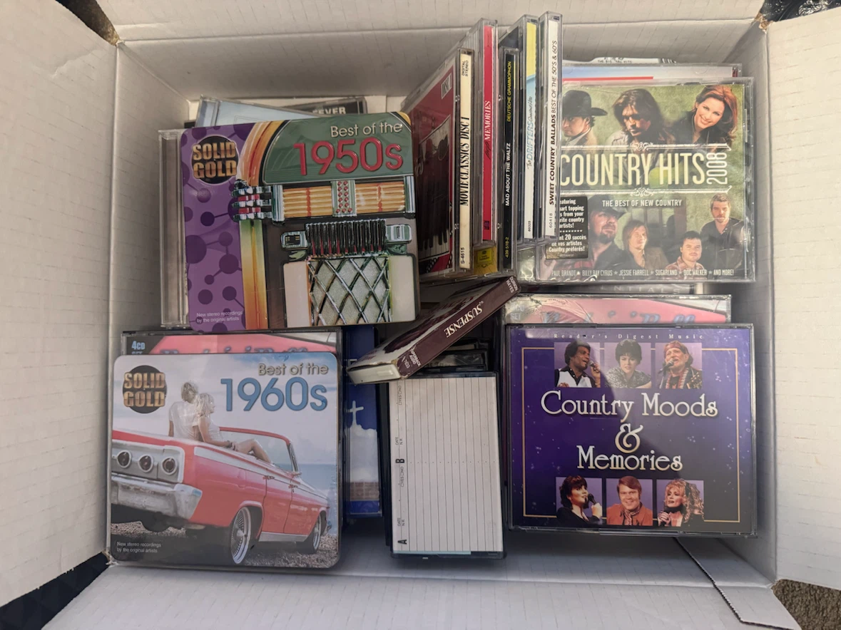 Big box full of CD’s and Cassettes