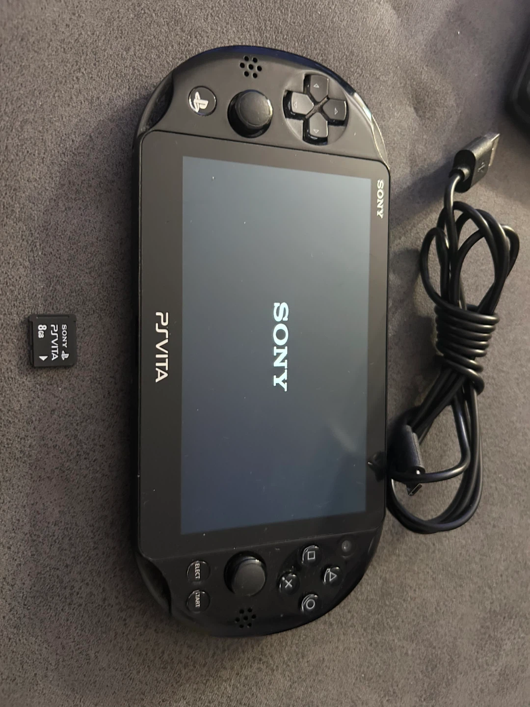 Ps Vita with 🔌 and 8GB Memory Card