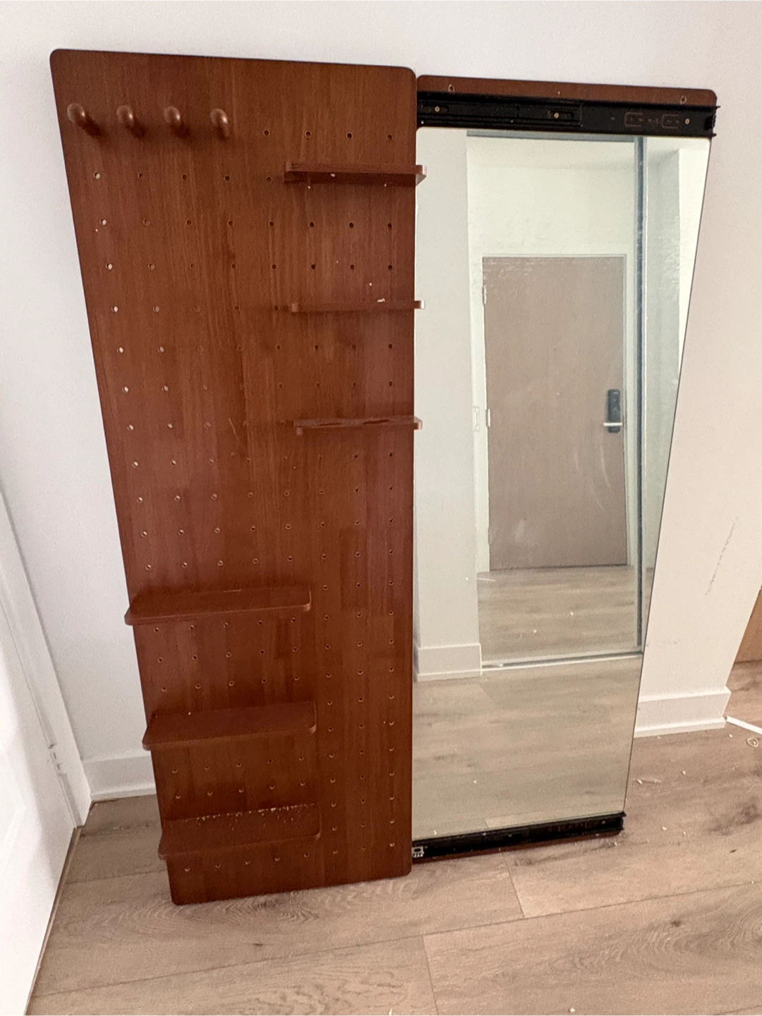 Sliding Mirror with Pegboard Storage