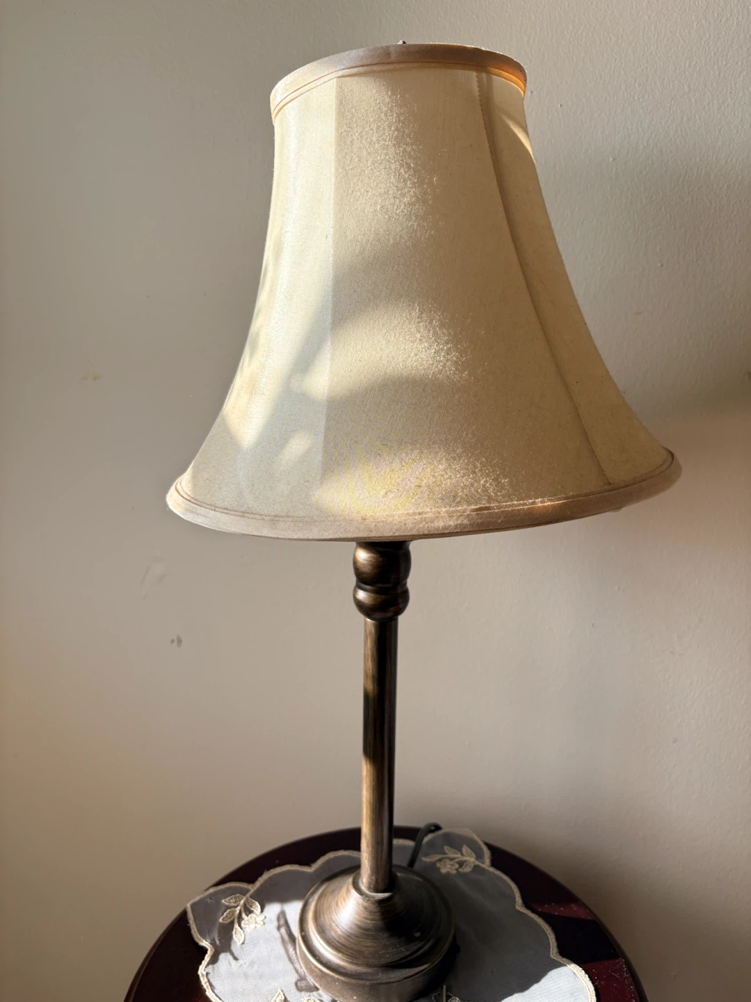 Table lamp with beige shade