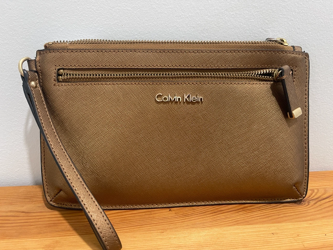 Calvin Klein metallic wristlet pouch
