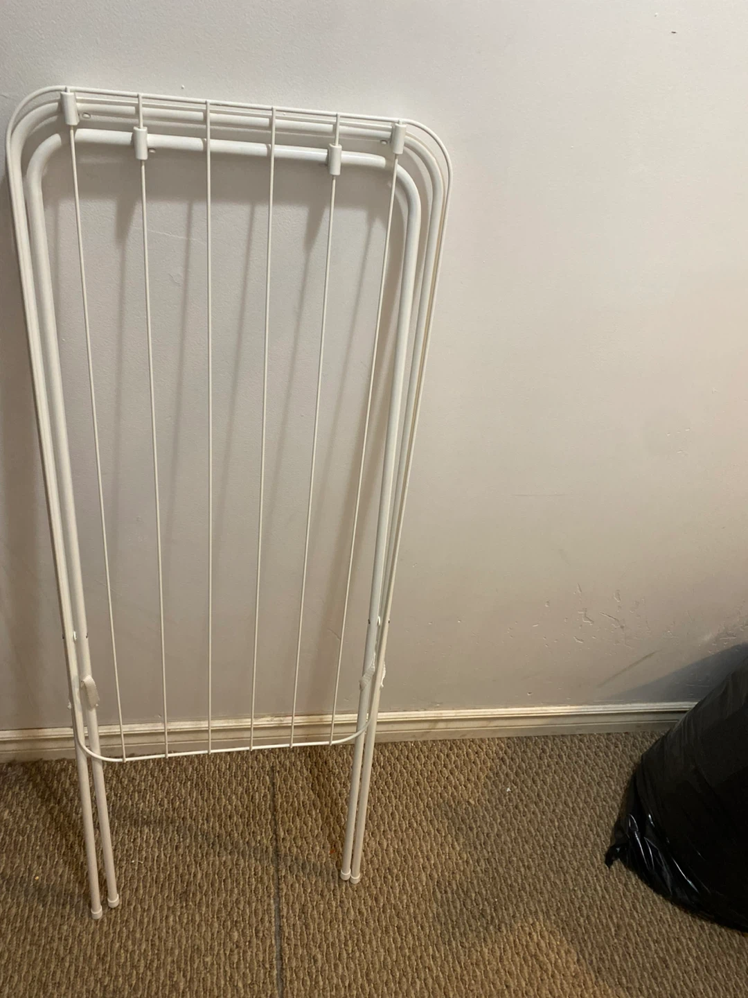 White folding clothes drying rack