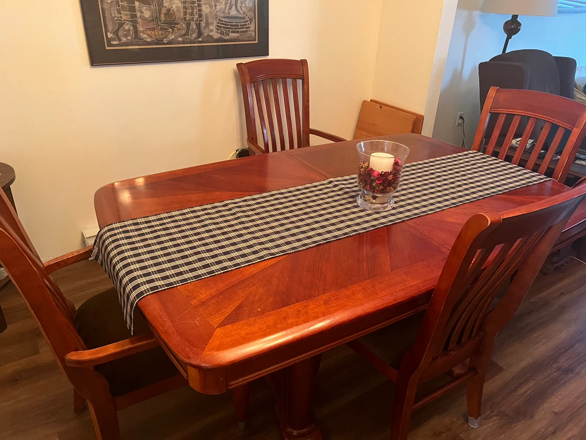 Upscale dining room table, chairs and cabinet