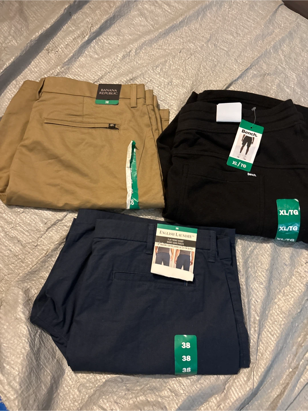 Three pairs of men's shorts, size 38 and XL