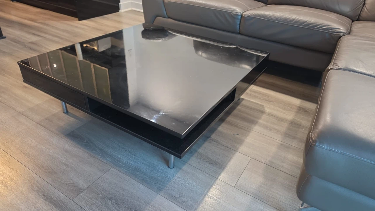 Grey sectional leather sofa and Black Coffee Table