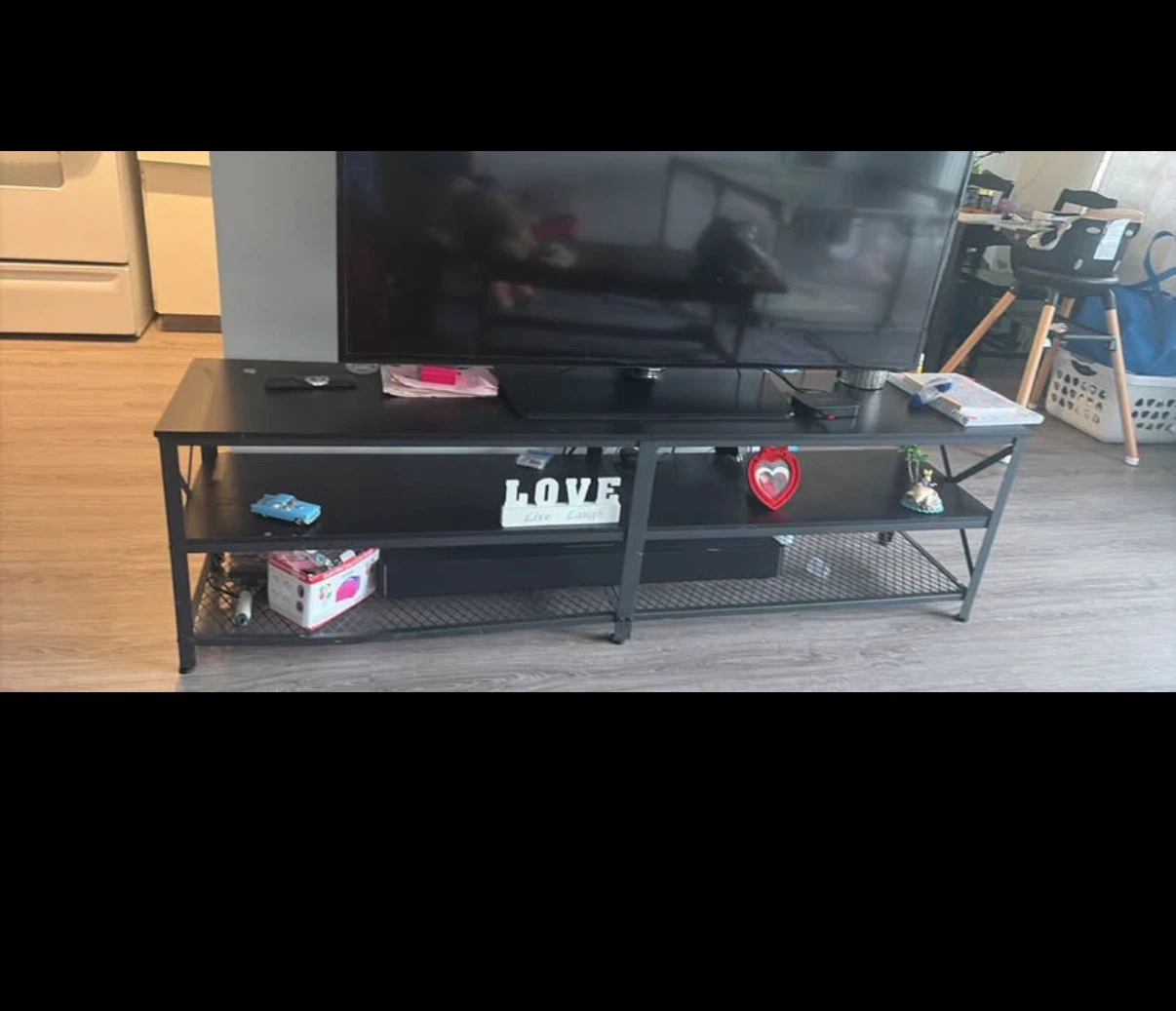 Black TV Stand with Built-in Power Outlet