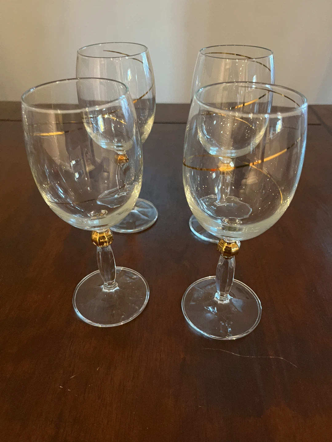 Set of 4 Elegant Wine Glasses with Gold Trim