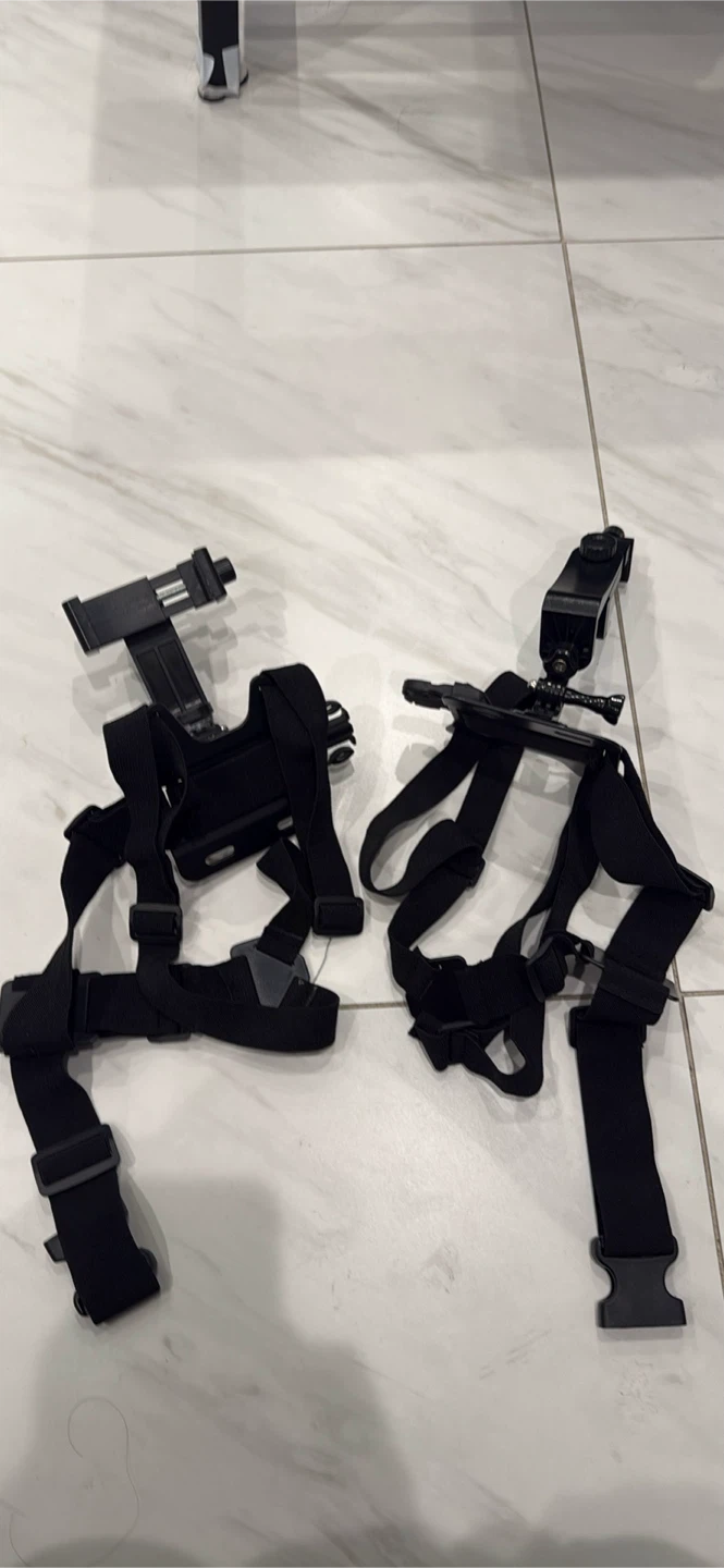 Two adjustable chest strap mounts for mobile phones