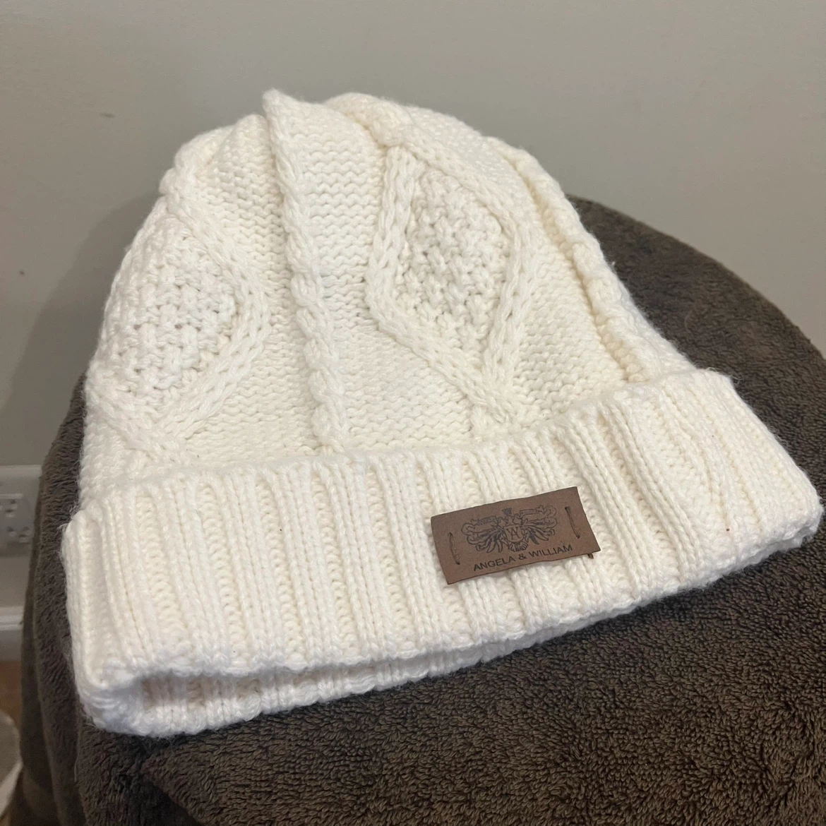 Angela & William White Cable Knit Beanie