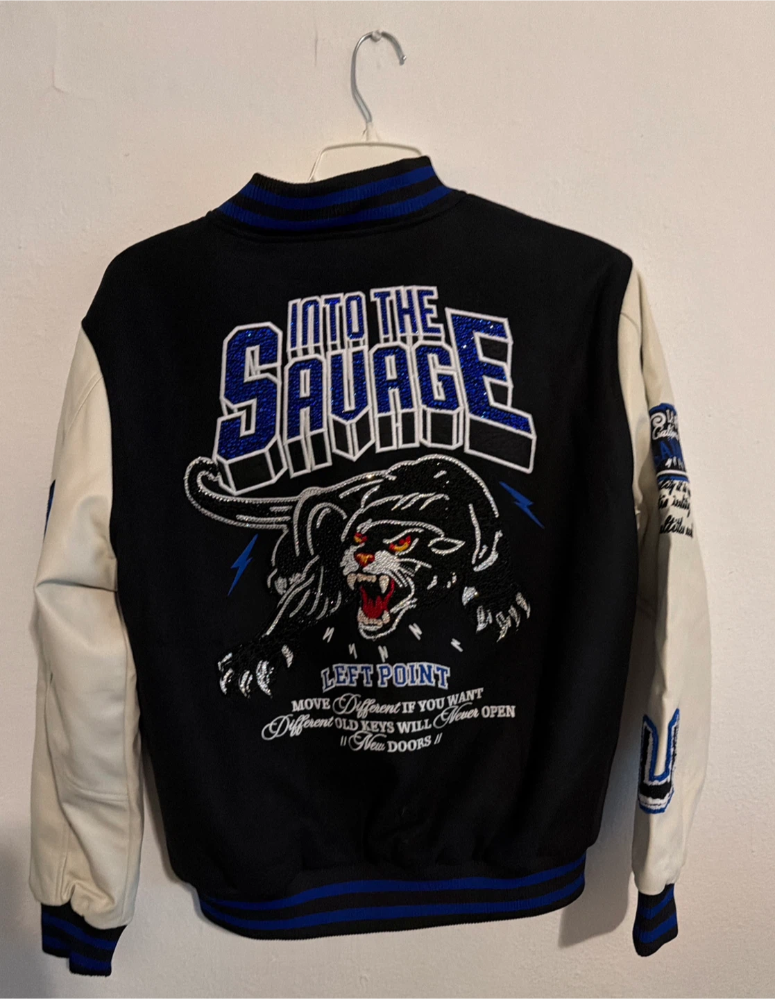 Left Point Into The Savage Varsity Jacket