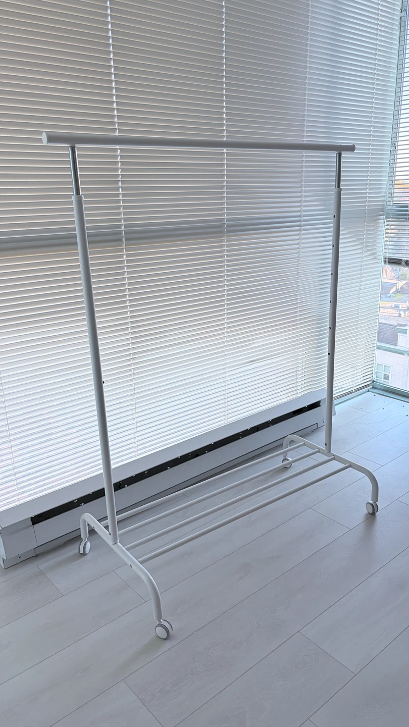 White Metal Clothing Rack on Wheels