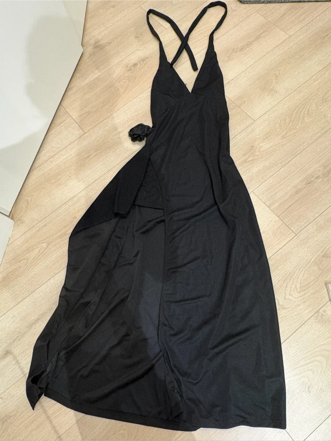 Black halter maxi dress with floral detail