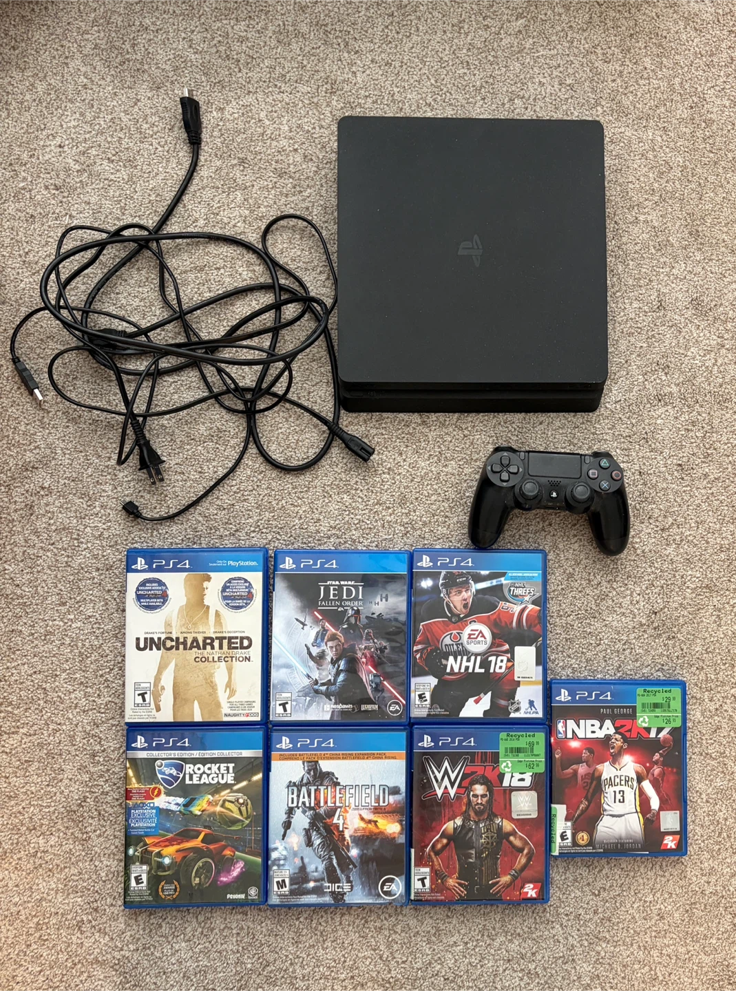 PlayStation 4 with 7 games and controller