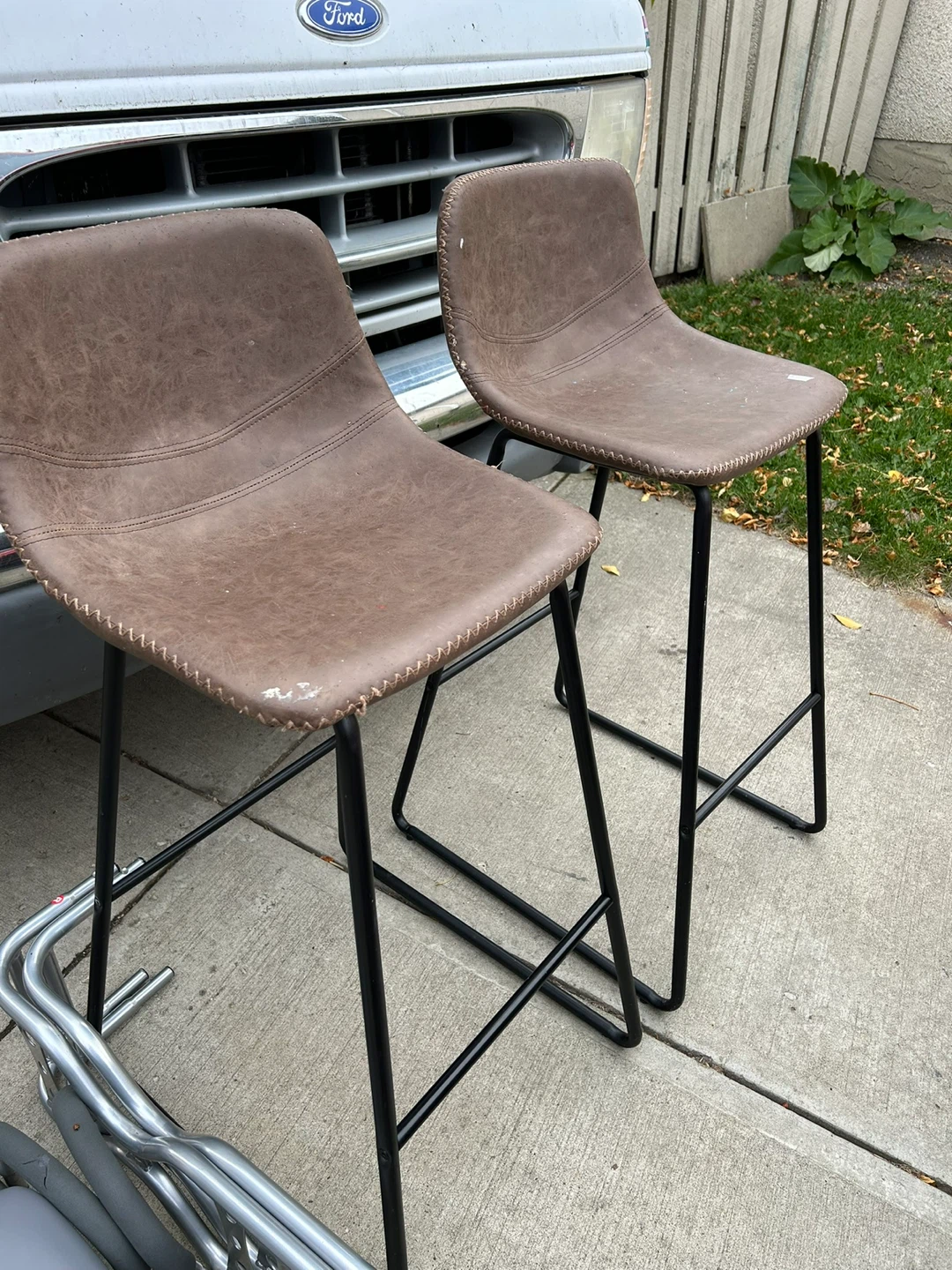 Two Brown Faux Leather Bar Stools