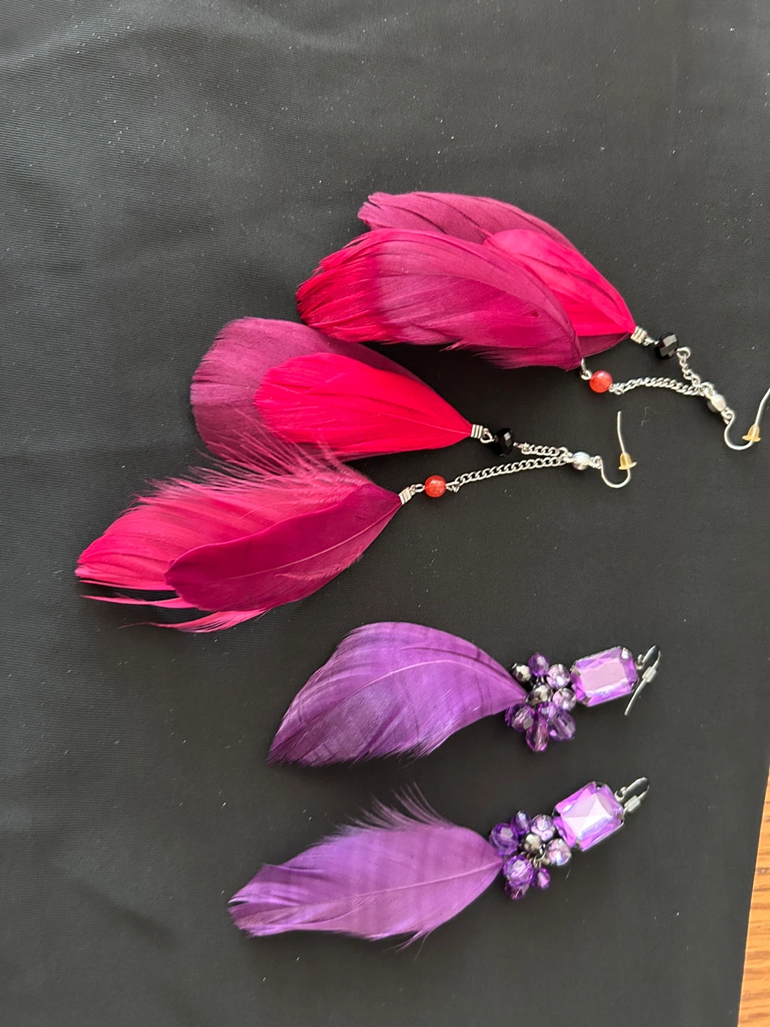 Purple feather earrings