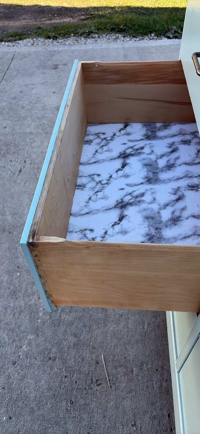 Light blue wooden dresser with storage baskets - photo 2
