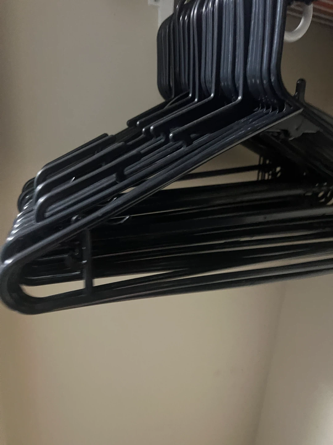 Set of black plastic clothes hangers - photo 2