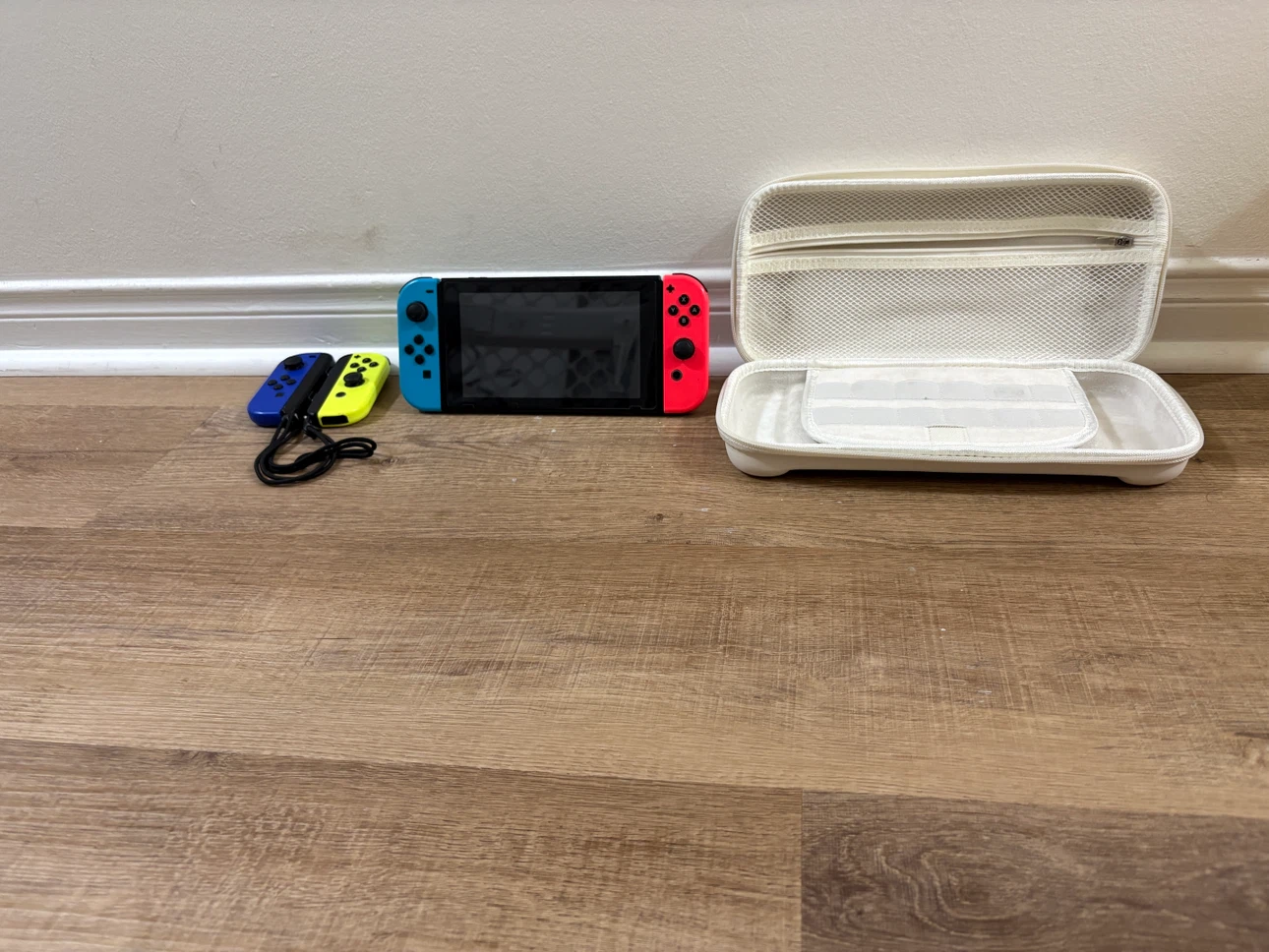 Nintendo Switch Bundle with 4 Joy-Cons, Straps & Carrying Case