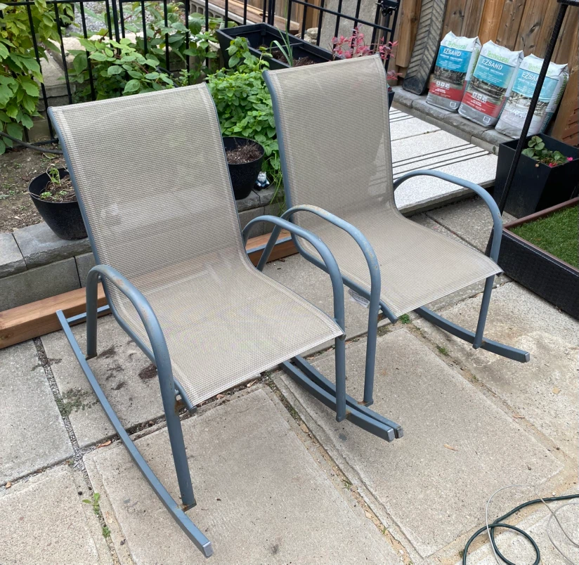 Two Metal Outdoor Rocking Chairs