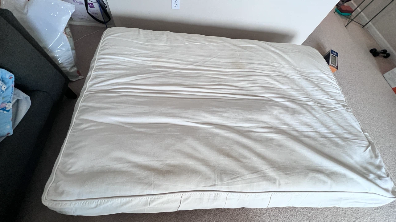 Wooden futon frame with mattress