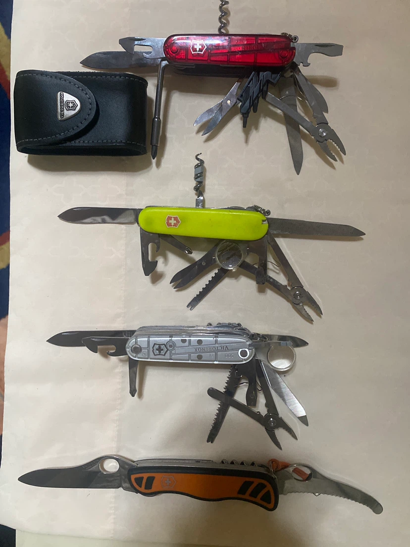 Set of 4 Victorinox Swiss Army Knives