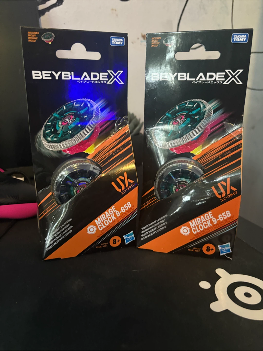 Two Beyblade X Mirage Clock 9-65B Tops