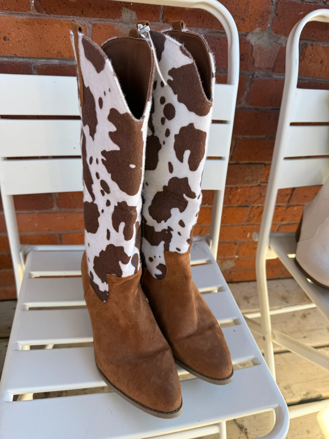 Cow print western boots
