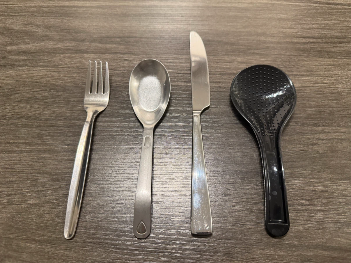 Stainless steel flatware set with rice paddle
