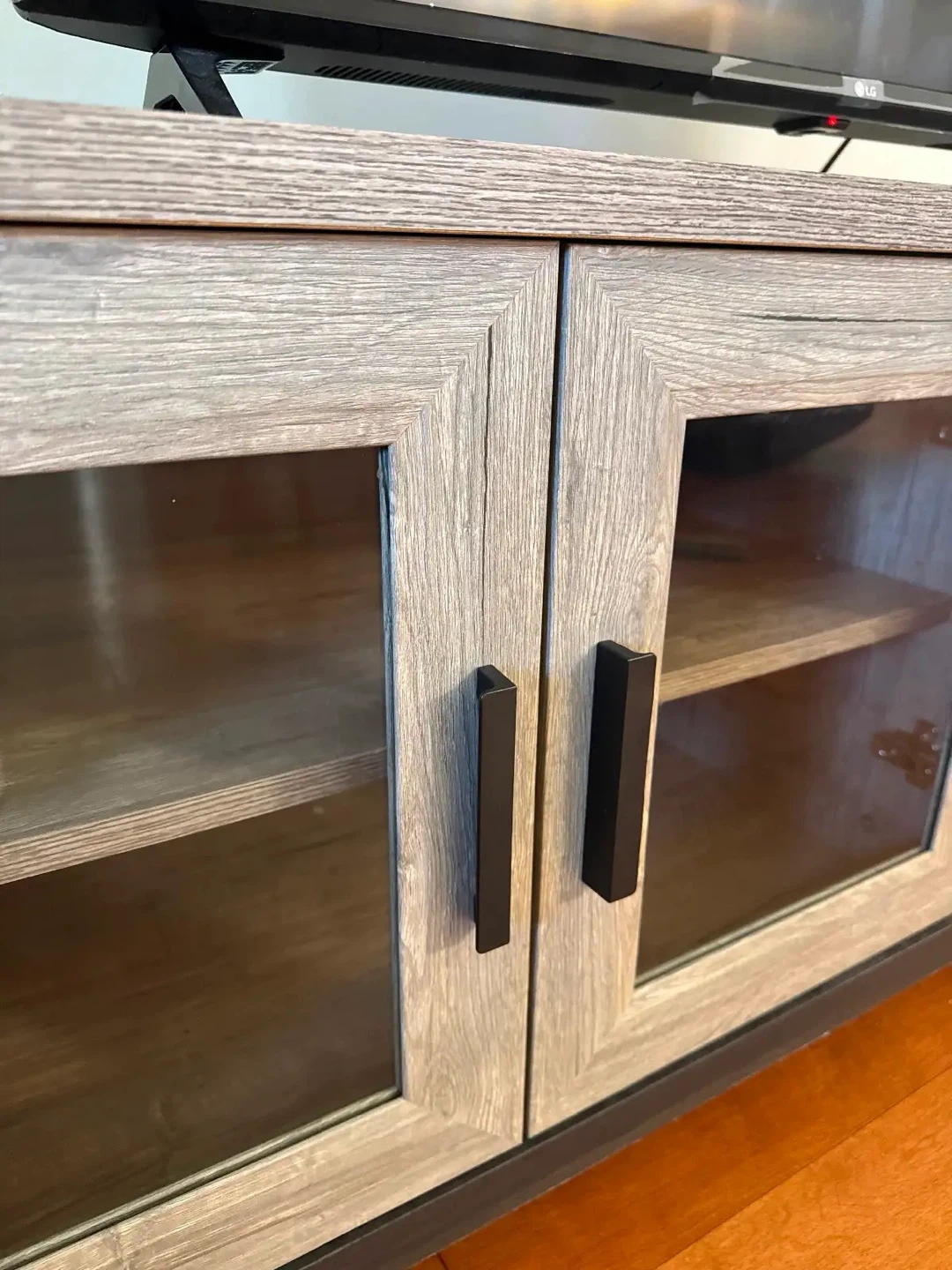 Rustic grey wood TV stand with glass doors - photo 3