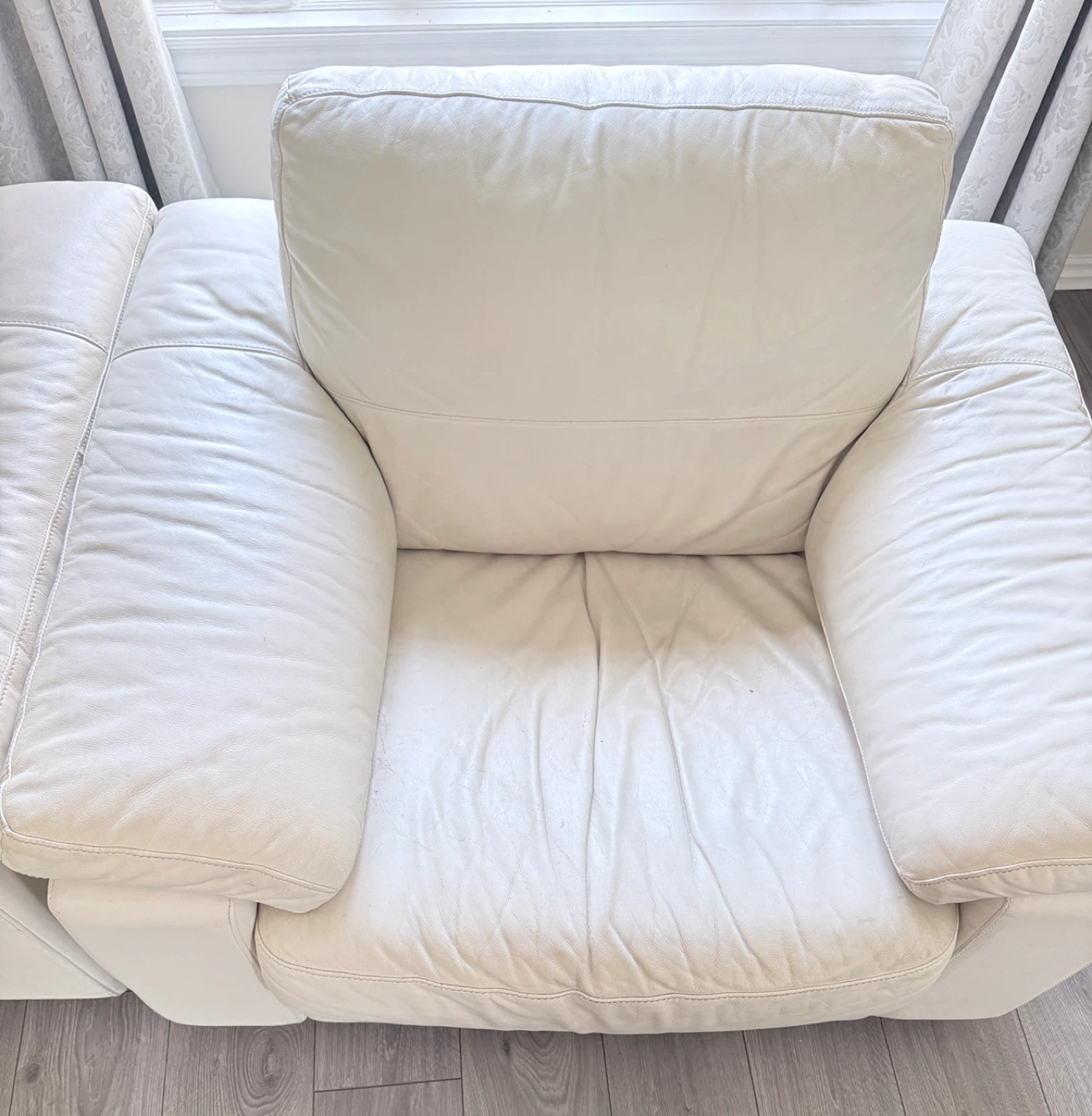 White leather loveseat and Chair