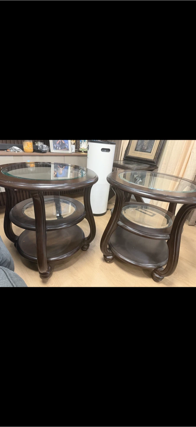 Set of two round dark wood side tables - photo 3