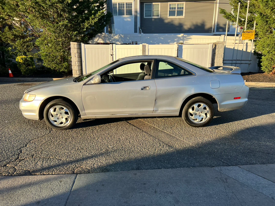 2000 Honda Accord LX. Amazing on Gas very reliable.