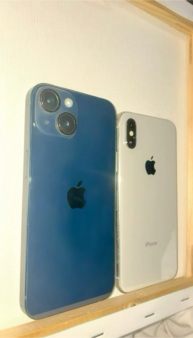 Two Apple iPhones. iPhone 14 and iPhone X.