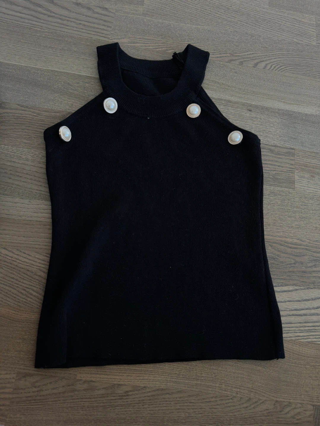 Designer’s in Balmain pearl buttons