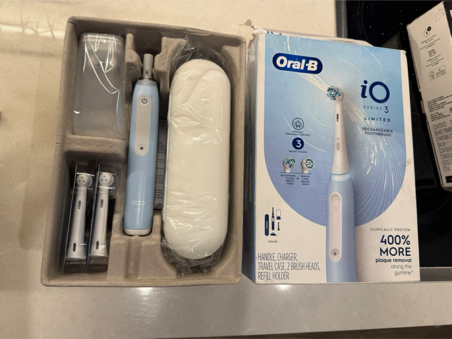 Oral-B iO Series yr 3 Rechargeable Toothbrush - Icy Blue - photo 2
