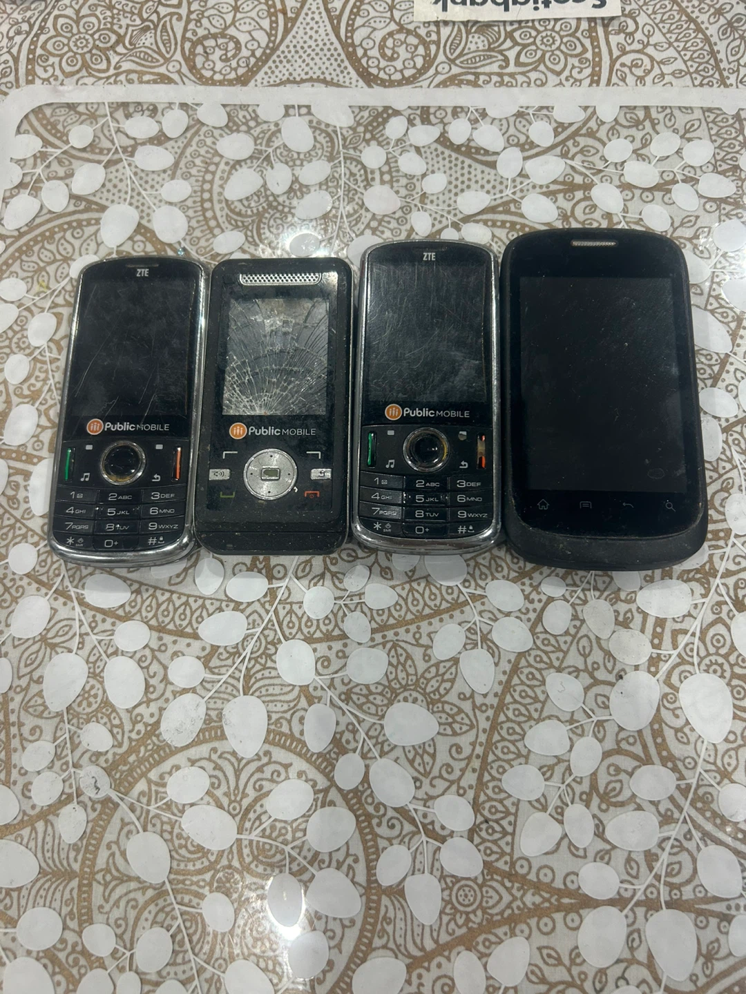 Lot of 4 ZTE Public Mobile cell phones
