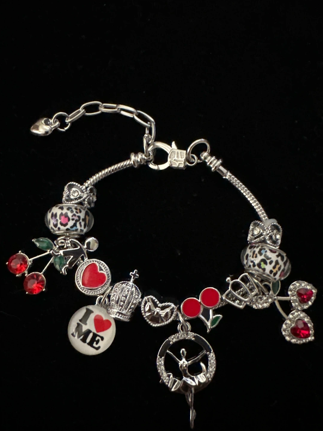 Silver Tone Charm Bracelet with Assorted Charms