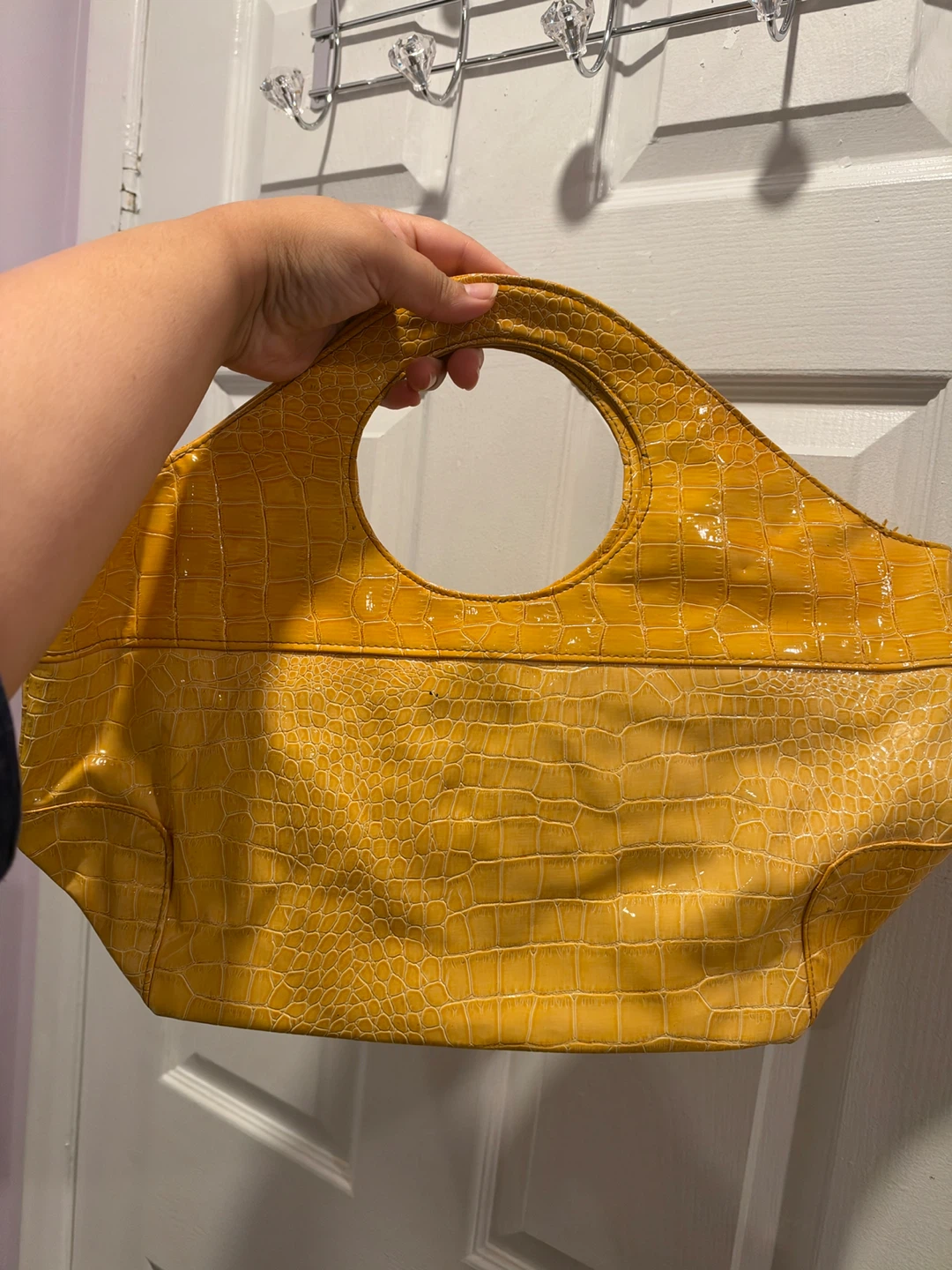 Yellow crocodile-embossed handbag