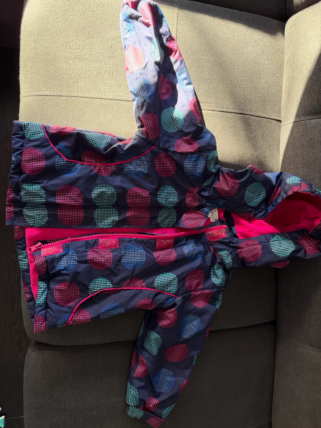 Children place winter jacket