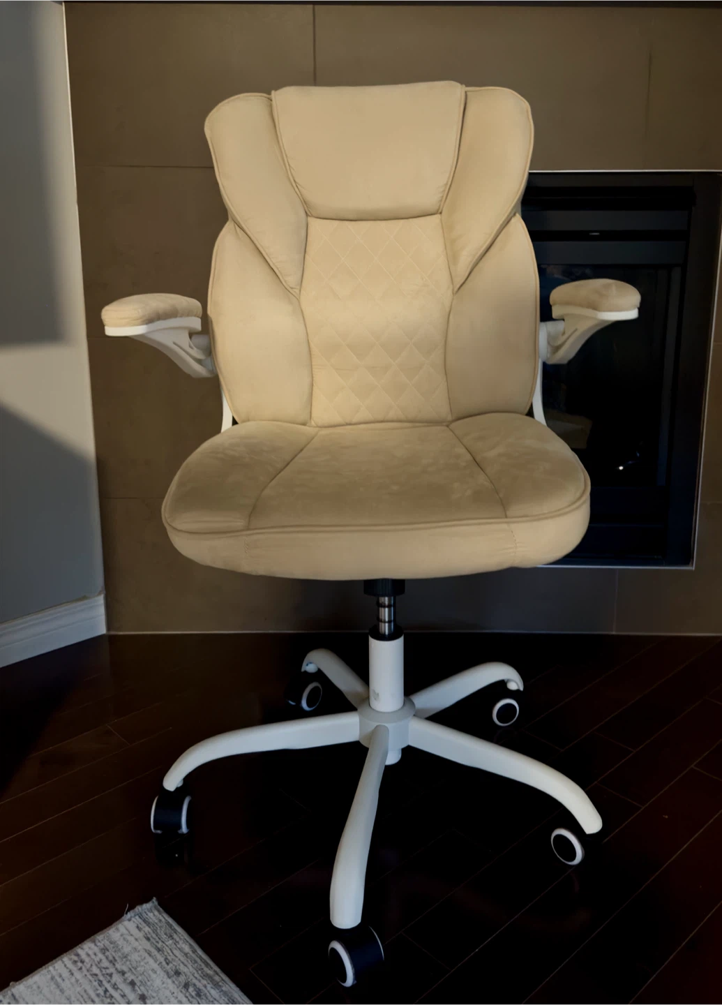 Beige Office Chair with Flip-Up Arms