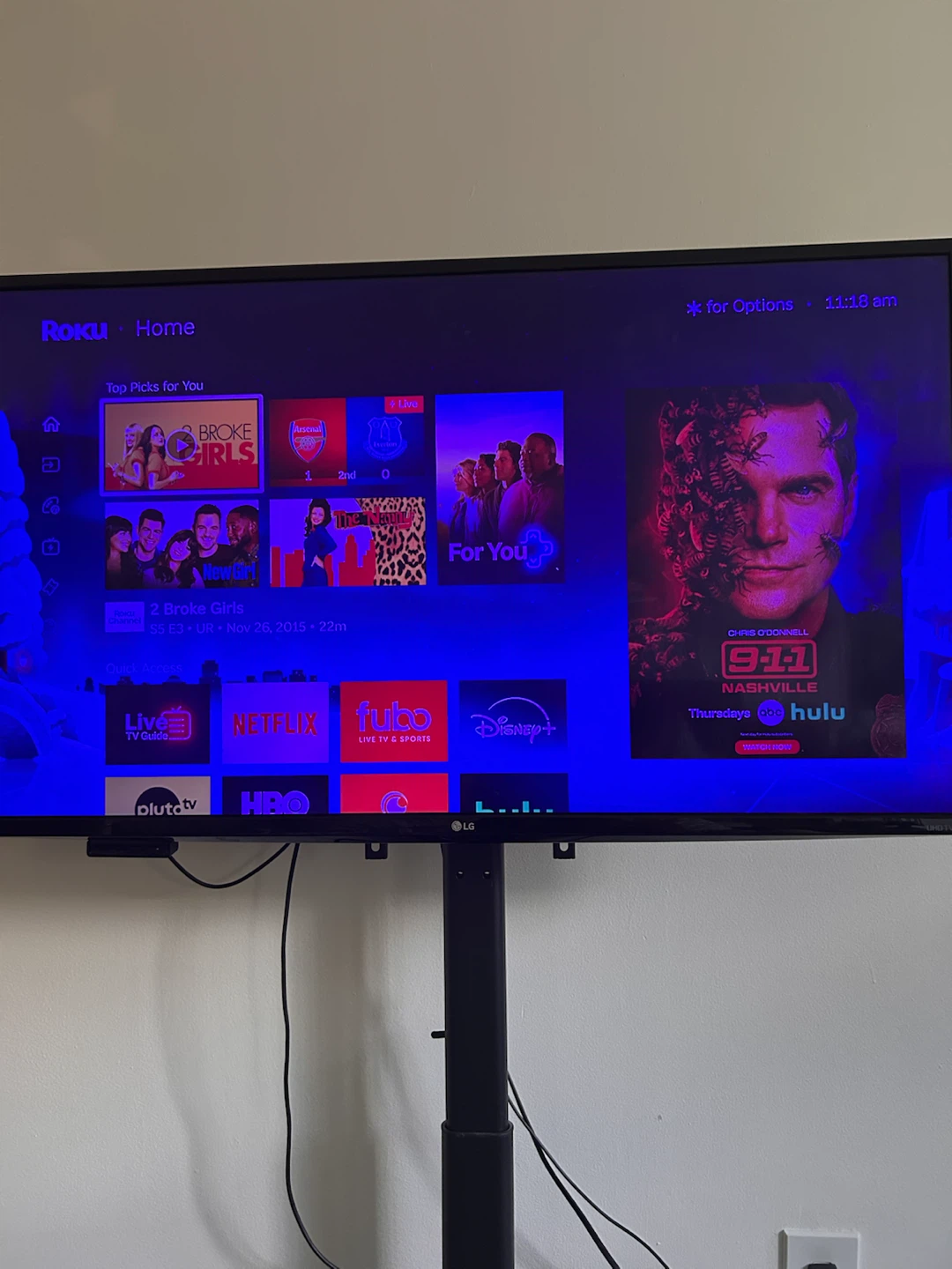 LG 4K UHD TV with Adjustable Floor Stand