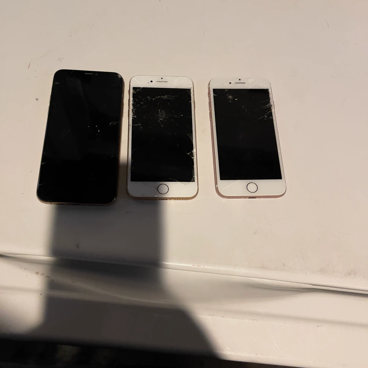 Three Apple iPhones
