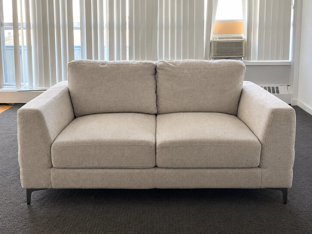 Practically New Leon’s Micah Loveseat – Beige