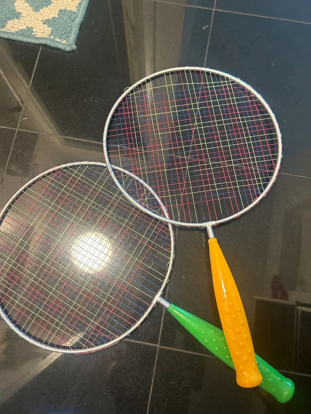 Two Badminton Rackets