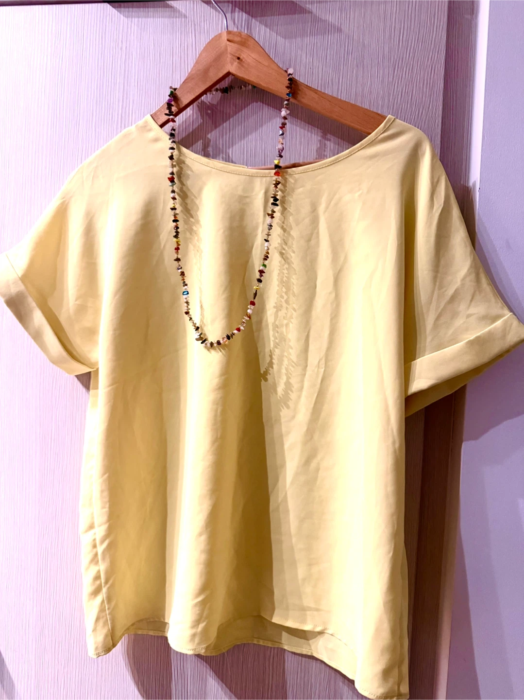Cute Yellow Top with a beaded necklace