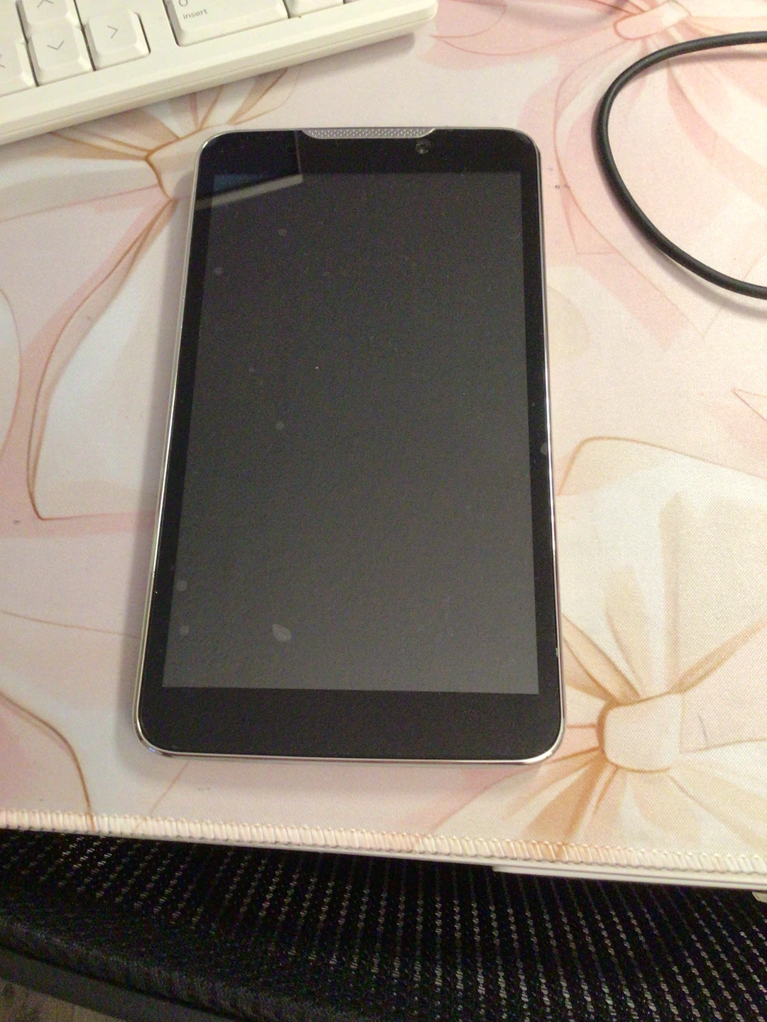 BLU Studio smartphone with floral wallet case