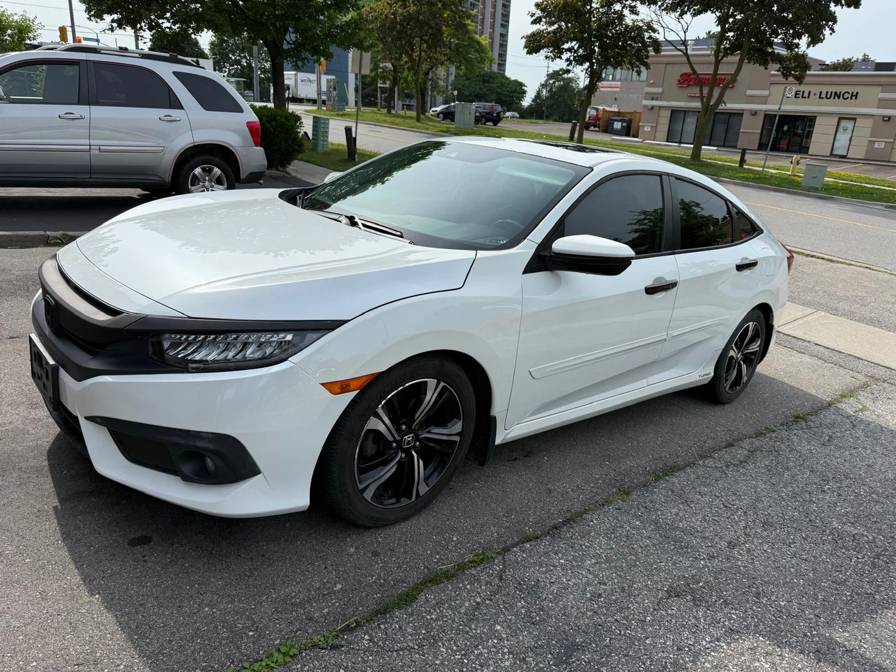 White Honda Civic Turbo Sedan