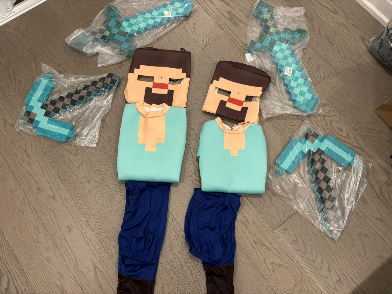 Minecraft Steve Costumes with pickaxe and sword