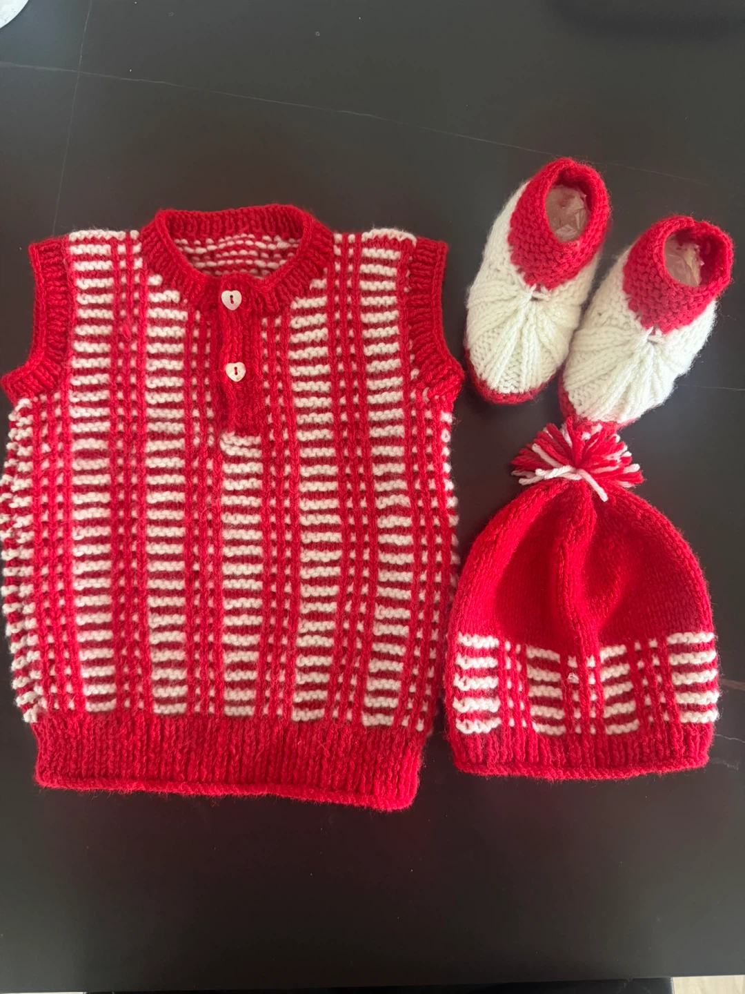 Hand-knitted baby sweater sets